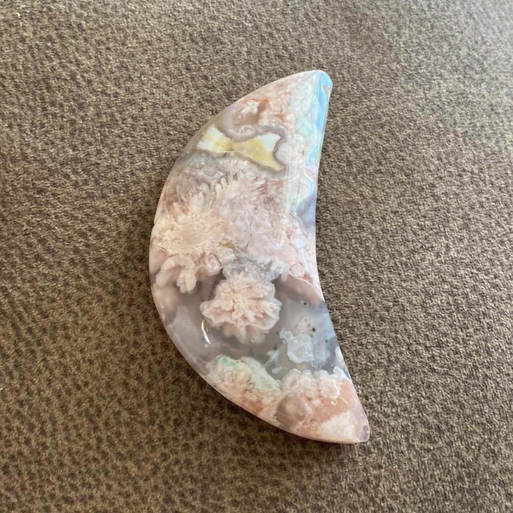 Crescent shaped flower agate crystal